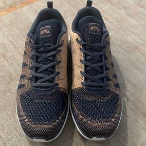 Men’s APL navy and rose gold techloom pro.